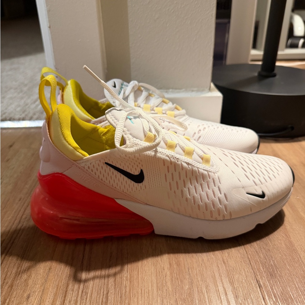 Nike Air Sneakers with Yellow Lining and Red Heel